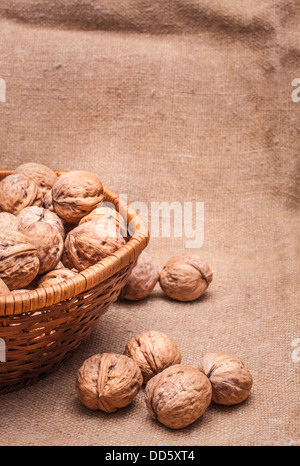 Unshelled Walnuts Lying On Sackcloth Stock Photo