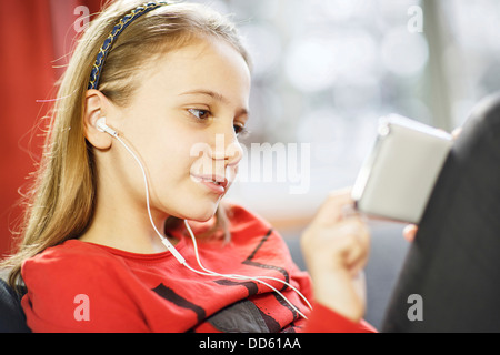 Girl listening to music, Osijek, Croatia, Europe Stock Photo