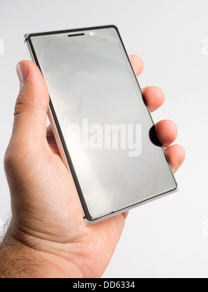 Hand holding smartphone Stock Photo