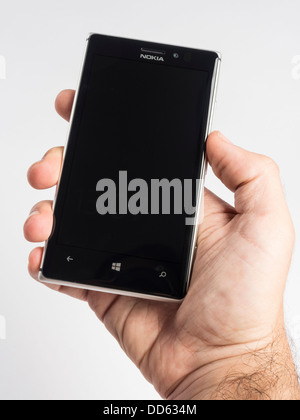 Hand holding Nokia Lumia 925 Windows Phone 8 smartphone Stock Photo