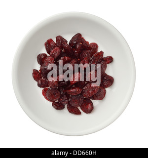 Dried cranberries in a bowl isolated on white background Stock Photo