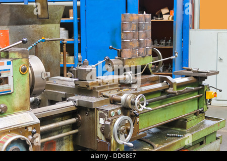 Old lathe in workshop of the plant Stock Photo
