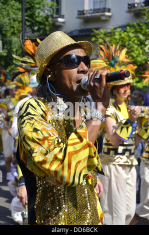 Notting Hill, London, UK. 25th Aug, 2013. Notting Hill Carnival takes place in August Bank Holiday since 1966, the Notting Hill Carnival is the largest festival celebration of its kind in Europe. Every year the streets of West London come alive, with the sounds and smells of Europe’s biggest street festival. © Marcin Libera/Alamy Live News Stock Photo