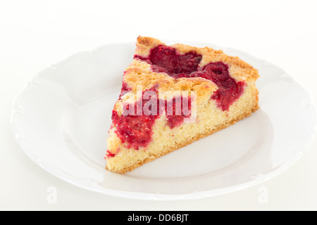 Eating delicious slice of raspberry cake Stock Photo