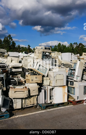 Junked crts computer monitors, tvs and old printers for recycling or safe disposal recycling Stock Photo