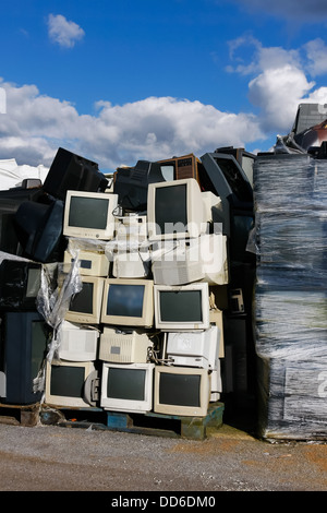 Junked crts computer monitors, tvs and old printers for recycling or safe disposal recycling, any logos and brand names have bee Stock Photo