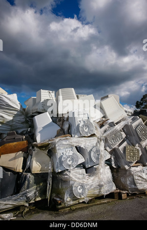 Junked crts computer monitors, tvs and old printers for recycling or safe disposal recycling, any logos and brand names have bee Stock Photo