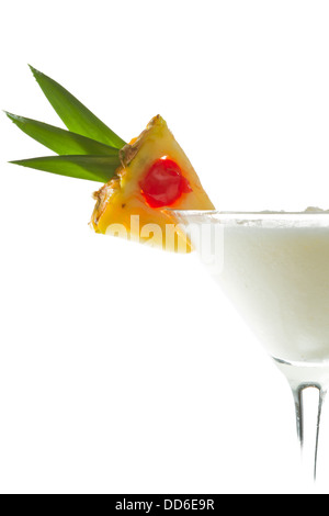 Pina colada cocktail garnished with a pineapple slice isolated on a white background Stock Photo