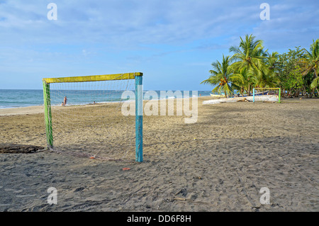 Tropical beach at dusk with football goal on the sand, Caribbean, Manzanillo, Costa Rica Stock Photo