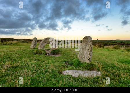 The Men-an-Tol standing stones Near Penzance in Cornwall, local legend says that passing a person through the holed stone cures Stock Photo