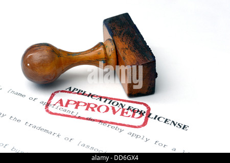 Application for license on white paper approved with stamp Stock Photo