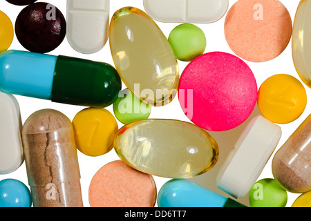 Different kinds of pills on white background Stock Photo