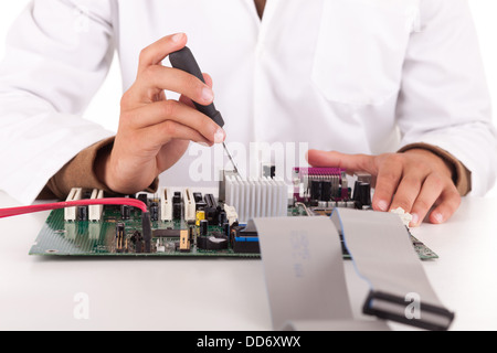 Happy and successful young computer engineer Stock Photo