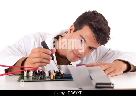 Happy and successful young computer engineer Stock Photo