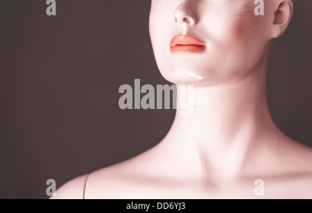 Front view of slightly damaged female adult mannequin Stock Photo