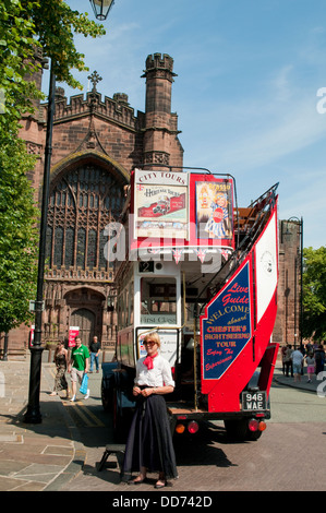 Tourist city tours bus in front of the Cathedral, Chester, UK Stock Photo