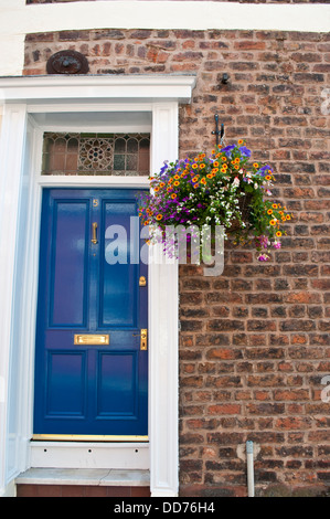 Posh house with a flower basket, Lorimers' Row, Chester, UK Stock Photo