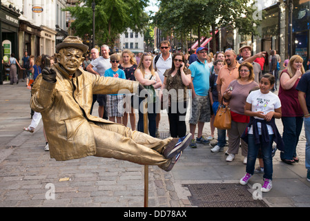 Levitating Man. Street performer / Busker. Covent garden. London Stock Photo