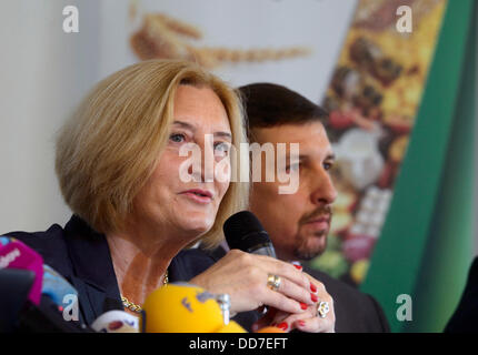 Deputy Minister of the ministry of agriculture and countryside development Zofia Szalczykova (left) and Wojciech Pobog-Pagowskiof the Polish Embassy in Prague speak during the press conference about the quality of the Polish food products in Prague, Czech Republic on August 28, 2013. (CTK Photo/Michal Kamaryt) Stock Photo