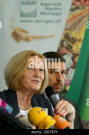 Deputy Minister of the ministry of agriculture and countryside development Zofia Szalczykova (left) and Wojciech Pobog-Pagowskiof the Polish Embassy in Prague speak during the press conference about the quality of the Polish food products in Prague, Czech Republic on August 28, 2013. (CTK Photo/Michal Kamaryt) Stock Photo