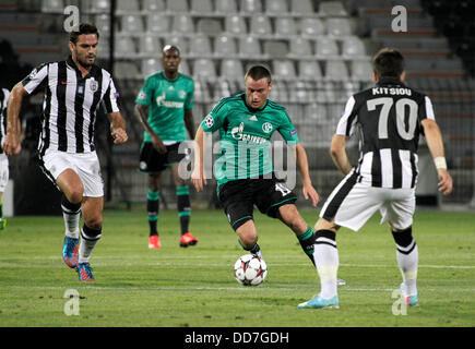 Thessaloniki, Greece. 27th Aug, 2013. Christian Clemens and Alexandros Tziolis during the Champions League 2nd leg Qualifier between Paok Salonika and Schalke from the Toumbas Stadium. Credit:  Action Plus Sports/Alamy Live News Stock Photo