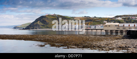UK, Wales, Ceredigion, Aberystwyth, seafront and pier at low tide, panoramic Stock Photo
