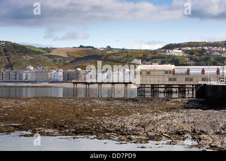 UK, Wales, Ceredigion, Aberystwyth, seafront and pier at low tide Stock Photo
