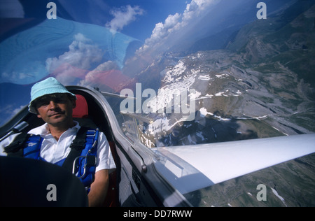 Inside view of glider plane Twin Astir flying over Tendenera mountains , Aragon, Spain Stock Photo