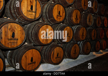 Port Wines and their makers under Terracotta roofs adjacent to the Douro River Sandeman Vintage Cellars,Porto,Oporto,Portugal Stock Photo