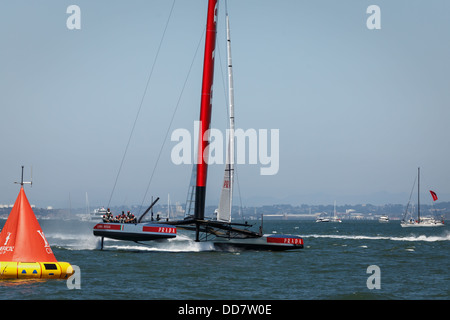 Team Luna Rossa AC 72 Sailboat flying on foil in Louis Vuitton Cup Stock Photo: 59795103 - Alamy