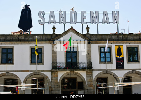 Port Wines and their makers under Terracotta roofs adjacent to the Douro River Sandeman Vintage Cellars,Porto,Oporto,Portugal Stock Photo