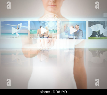 woman pressing button on virtual screen Stock Photo