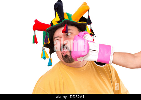 A jokester man got smashed by strong boxer, he is looking at copy space, isolated on white Stock Photo