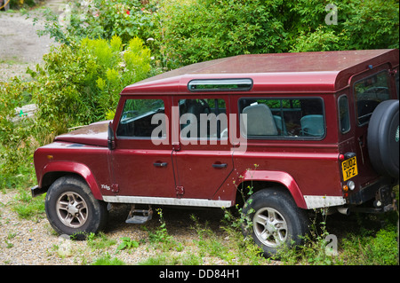 Land Rover Defender TD5 110 parked on waste ground in York North Yorkshire England UK Stock Photo