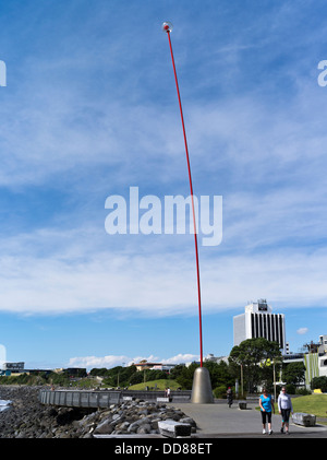 dh New Plymouth TARANAKI NEW ZEALAND Wind wand 48 metre kinetic sculpture seafront promenade couple strolling Stock Photo