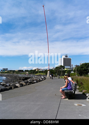 dh New Plymouth TARANAKI NEW ZEALAND Wind wand 48 metre kinetic sculpture seafront promenade couple bench Stock Photo