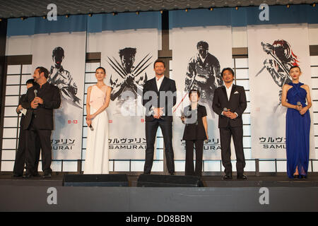 Tokyo Japan. 28th Aug, 2013. The Wolverine Samurai Japan Movie Premiere took place in Tokyo together with hundreds of cheering Fans in the Roppongi Hills Arena. Director James Mangold and the Stars Hugh Jackman, Tao, Hiroyuki Sanada, Rila Fukushima came on Stage to greet all the Fans and promote the Movie. The movie will be aired in Japan from September 13th. Credit:  Michael Steinebach/AFLO/Alamy Live News Stock Photo