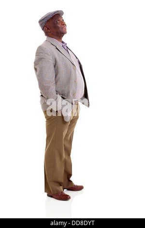 old afro American man looking up with hands in pockets Stock Photo