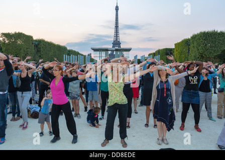 Paris, France, Large Crowd People, Women, Dancing Near Eiffel Tower, Flash Mob, to Celebrate Martin Luther King Anniversary, 'SOS Racisme', 'Institute International du Theatre' Stock Photo
