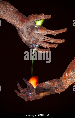 Seattle Wa Liquid Fire Pouring From One Metal Sculpture Hand To Stock Photo Alamy