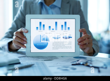 Close-up shot of a businesswoman presenting the results of the financial analysis Stock Photo