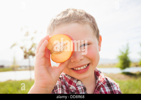 Blonde cute boy posing over white background Stock Photo - Alamy