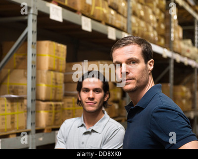 Workers standing in textile factory Stock Photo