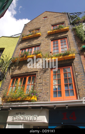 Backrub Massage in Neal's Yard Covent Garden London Stock Photo