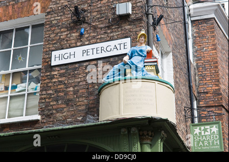 Minerva Goddess of Wisdom & Drama statue on corner of High Petergate in the city centre of York North Yorkshire England UK Stock Photo