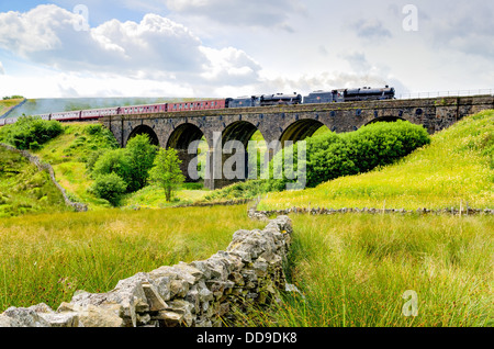 A pair of steam trains on the Settle to Carlisle line Stock Photo