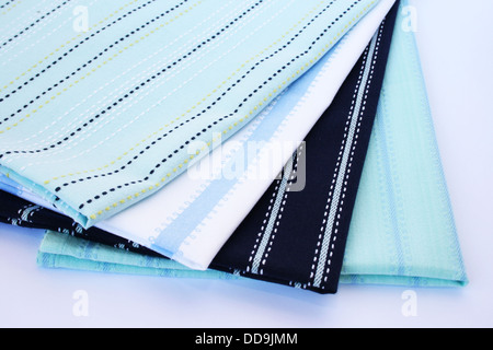 Kitchen towels isolated on gray background. Stock Photo