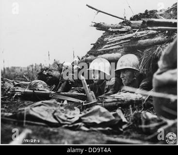 Pfc. Hugo J. Wagner (left), Ferdernan, Indiana, and Pfc. Albert W. Weaver, Mt. Vernon, N.Y., in a pillow which had... - - 195922 Stock Photo