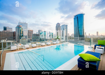 Rooftop swimming pool with a skyline view of Tel Aviv and Ramat Gan  Stock Photo