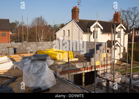 self building house, constructing upper floor, with traditional concrete block construction Stock Photo